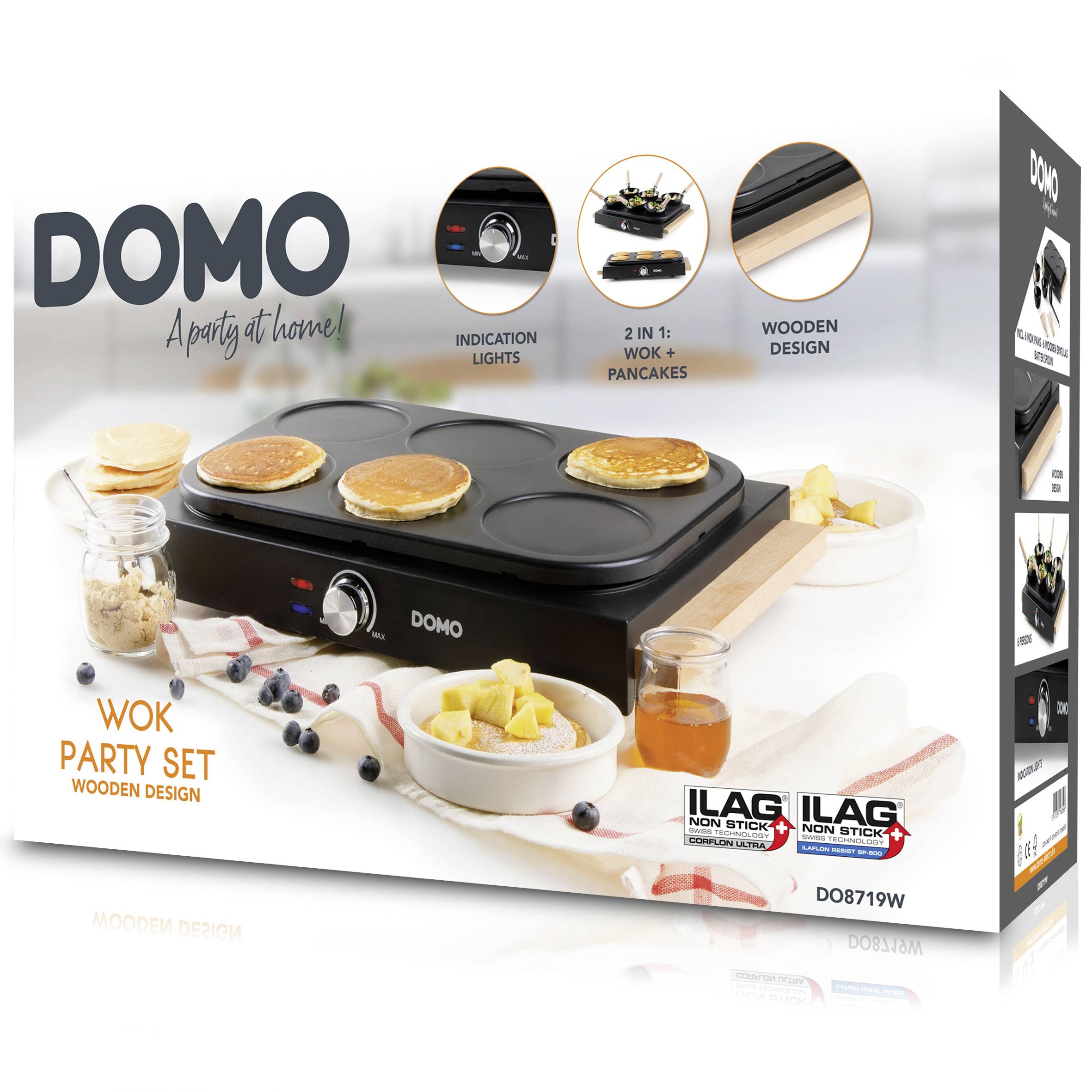 'DOMO' Wok-Party-Set Verpackung mit Pfannkuchen auf der Kochplatte, Umgebungsbild mit Zutaten. Indikationsleuchten und Holzdesign hervorgehoben.