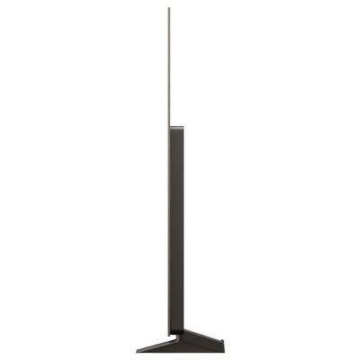 Seitenansicht eines ultraflachen, modernen Flachbildschirm-Fernsehers auf einem Ständer, der seinen schlanken Rahmen und minimalistischen Designstil hervorhebt.