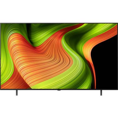 Ein Fernsehbildschirm zeigt ein abstraktes Design aus wirbelnden grünen und orangefarbenen Linien, die einen dynamischen und lebendigen visuellen Effekt erzeugen.