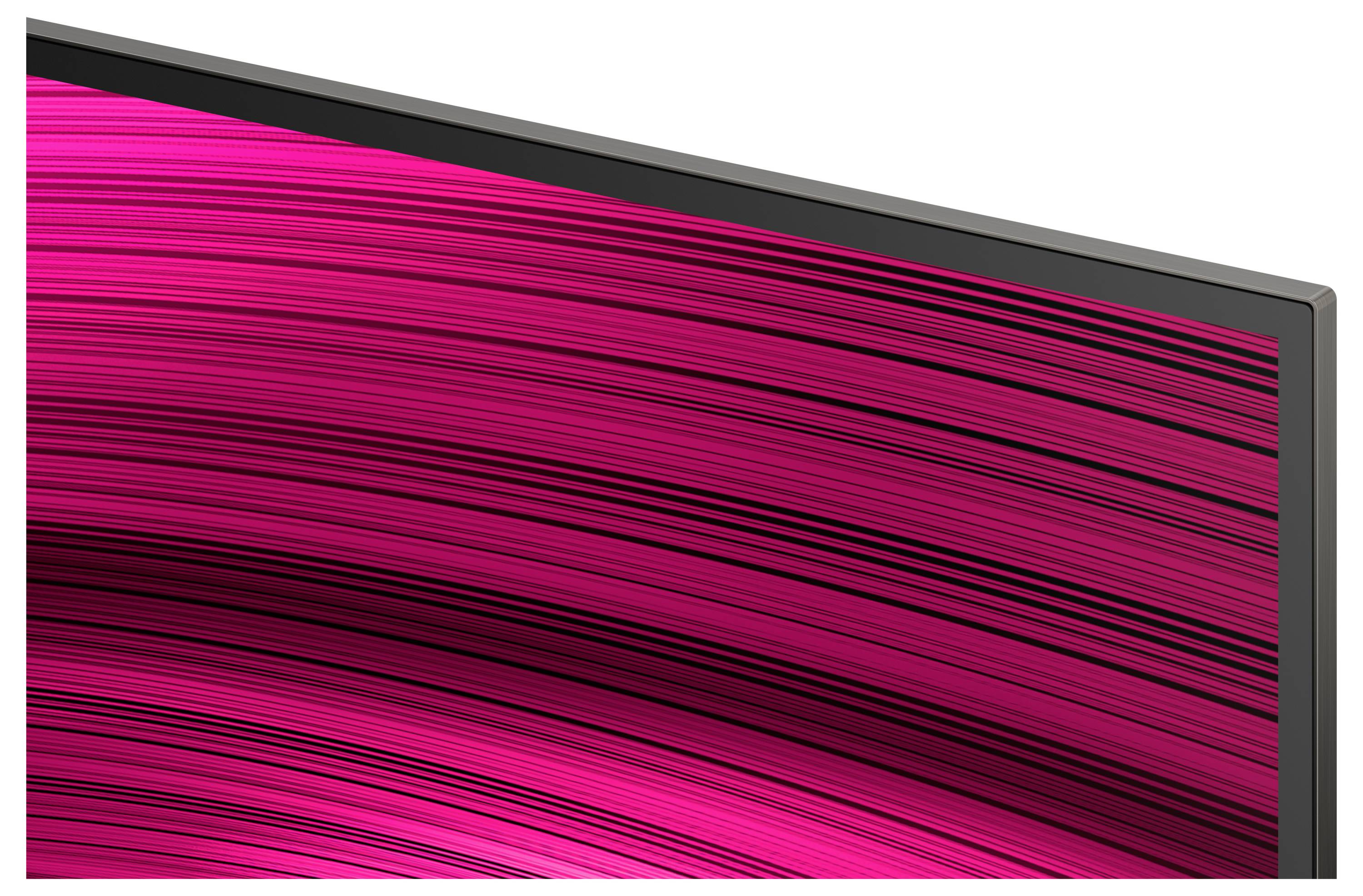 Nahaufnahme einer Ecke eines Flachbildfernsehers mit dünnem schwarzem Rahmen; der Bildschirm zeigt ein lebhaftes, wirbelndes Muster in Rosa und Schwarz.