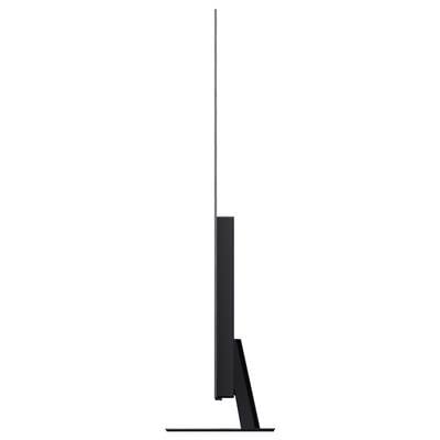 Seitenansicht eines ultra-dünnen, modernen Flachbildschirm-Fernsehers auf einem Ständer, der sein schlankes Design und minimalistisches Profil veranschaulicht.