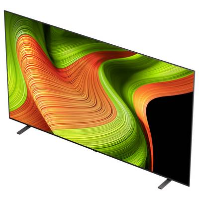 Ein schlanker, moderner Flachbildschirm-Fernseher, der einen lebendigen abstrakten Wirbel aus grünen, orangefarbenen und schwarzen Farben zeigt.