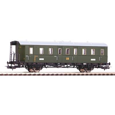Grüner Modell-Eisenbahnwaggon der Deutschen Reichsbahn, seitlich dargestellt auf einem Gleis, mit mehreren Fenstern und schwarzen Rädern.