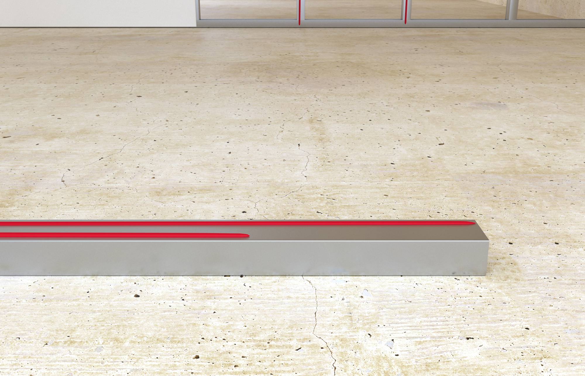 Leerer Betonboden mit einer niedrigen grauen rechteckigen Plattform, die im Vordergrund durch eine rote Linie markiert ist; geschlossene Glastüren im Hintergrund.