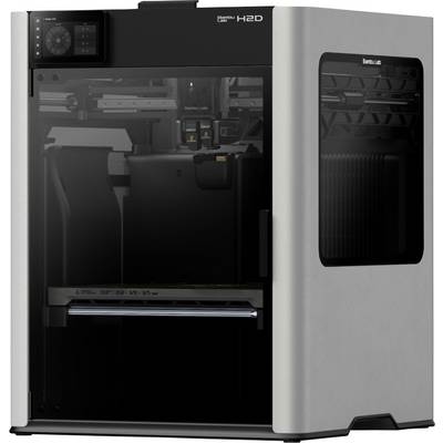 Ein moderner 3D-Drucker mit einem kompakten Design, schwarzer Front und silbernem Gehäuse. Sichtbare Druckkammer hinter Glasfenster.