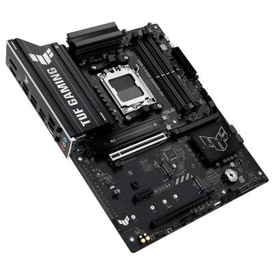 Mainboard von oben, markiert als 'TUF Gaming'. Es enthält PCIe-Steckplätze, RAM-Bänke und Anschlüsse für CPU und Peripheriegeräte.