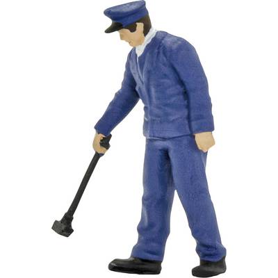 Eine Modellfigur eines Eisenbahnarbeiters in blauer Uniform, der mit einem Hammer arbeitet.