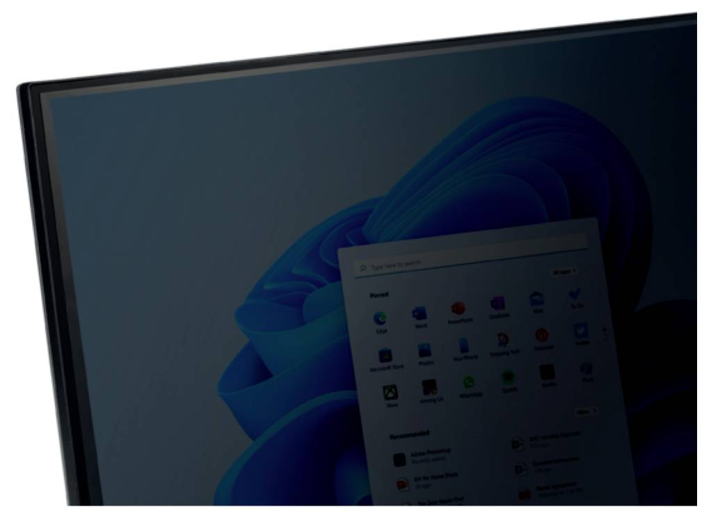 Ein Computermonitor zeigt das Startmenü eines Betriebssystems vor einem abstrakten, welligen blauen Hintergrund.
