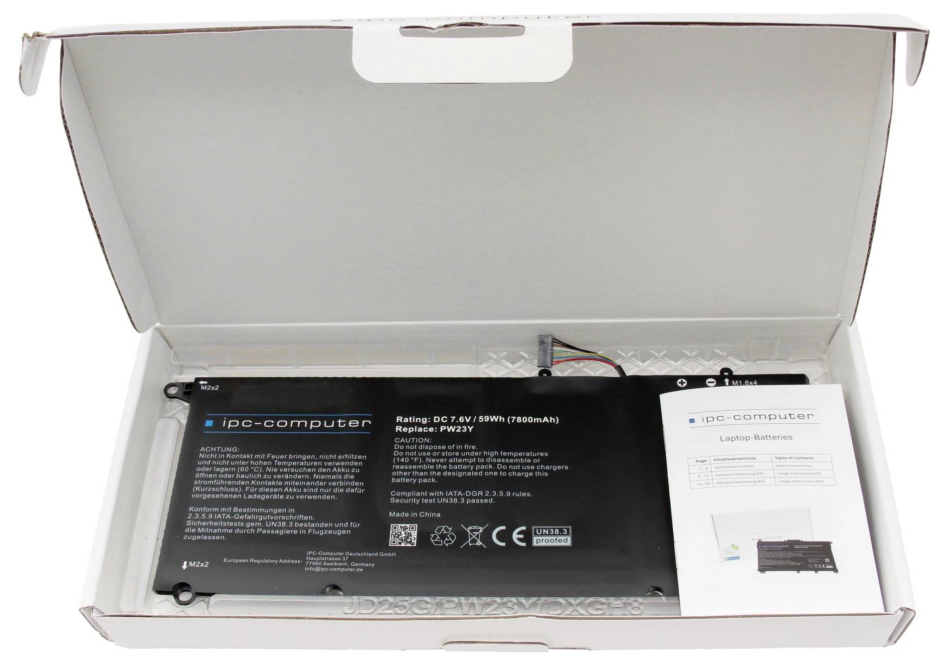 Laptop-Akku in geöffneter Verpackung mit Bedienungsanleitung.