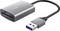 USB-Kartenleser von Trust mit einem USB-Kabel, geeignet für verschiedene Speicherkartentypen. Hauptsächlich in Silber gestaltet.