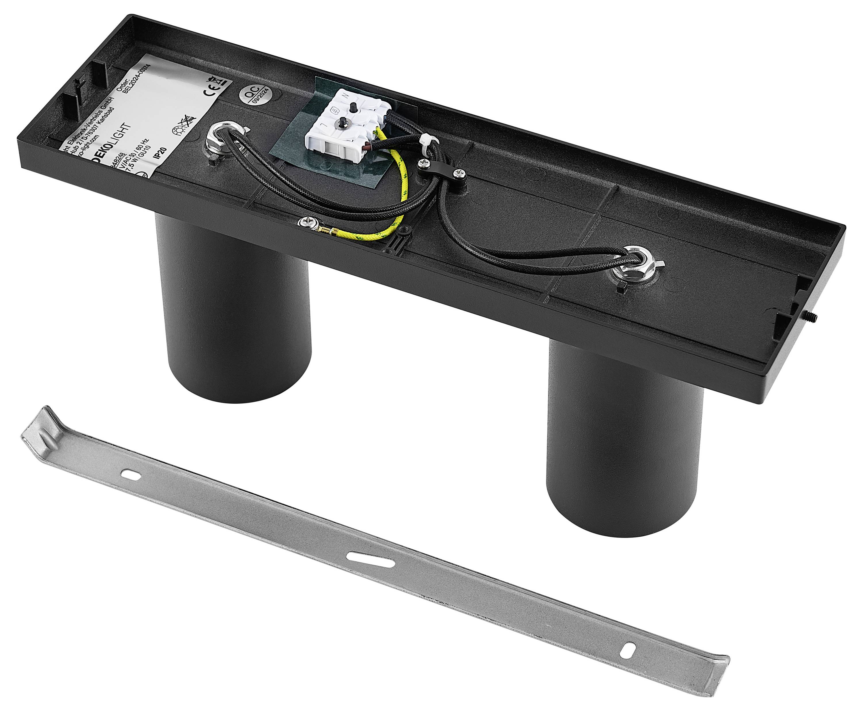 'Eine schwarze elektrische Komponente mit Kabeln und einem silbernen Metallstreifen daneben, geeignet für Unterputzinstallationen.'