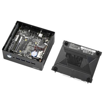 Ein geöffneter Mini-PC mit sichtbaren Hardwarekomponenten wie einem Mainboard, Speicherslots und Anschlüssen. Daneben die abgenommene Gehäuseabdeckung.