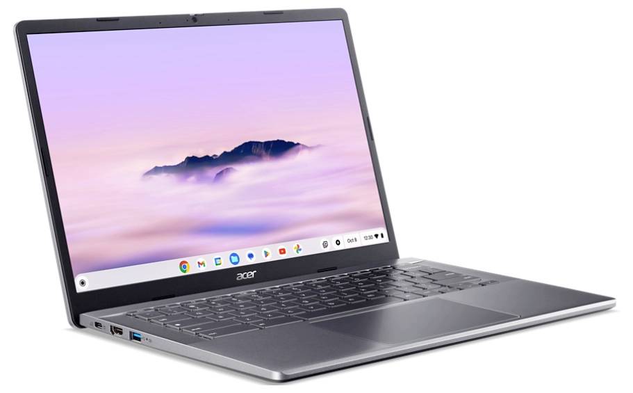 Ein Laptop mit geöffnetem Bildschirm zeigt ein Hintergrundbild mit einem nebligen Bergpanorama bei Sonnenaufgang.