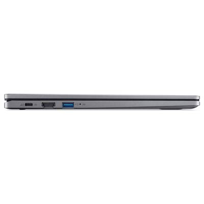 Ein geschlossenes silbernes Laptop von der Seite gesehen mit sichtbaren Anschlüssen: USB, HDMI und Stromanschluss.
