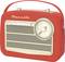 Rotes Retro-Radio mit Tragegriff, Skala für FM-Tuning und Lautsprechergitter. Beschriftung 'Transita'. Verfügt über DAB+, FM, BT, AUX.