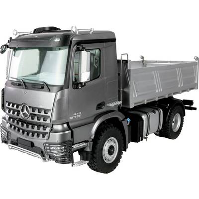 Grauer Lkw von der Seite mit offener Ladefläche. Ideal für Transport oder Bauprojekte.