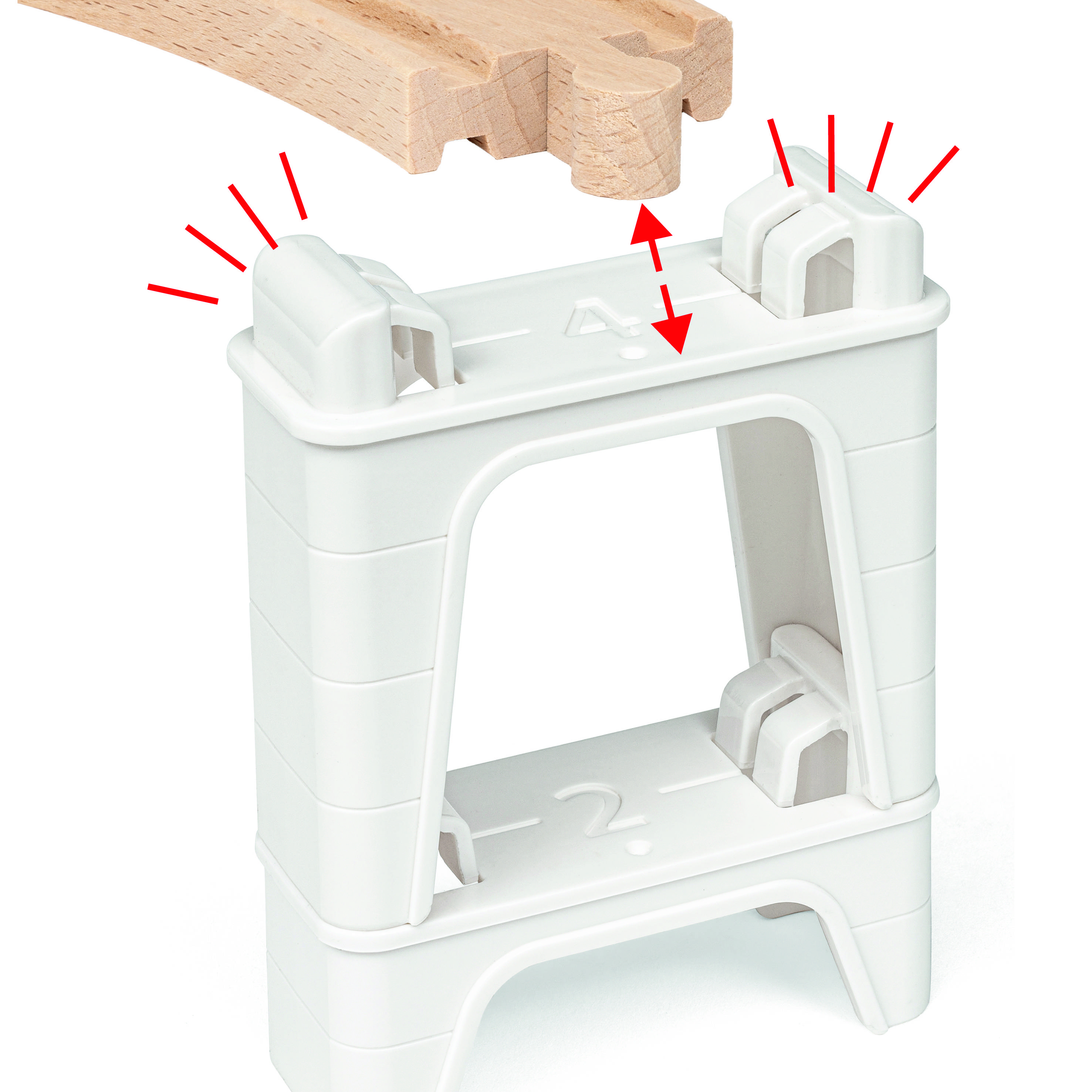 'Bewegliche Brücke' aus Holzspielzeugbahn mit weißem Kunststofftunnel. Rote Pfeile und Linien zeigen mechanische Verbindungen an.