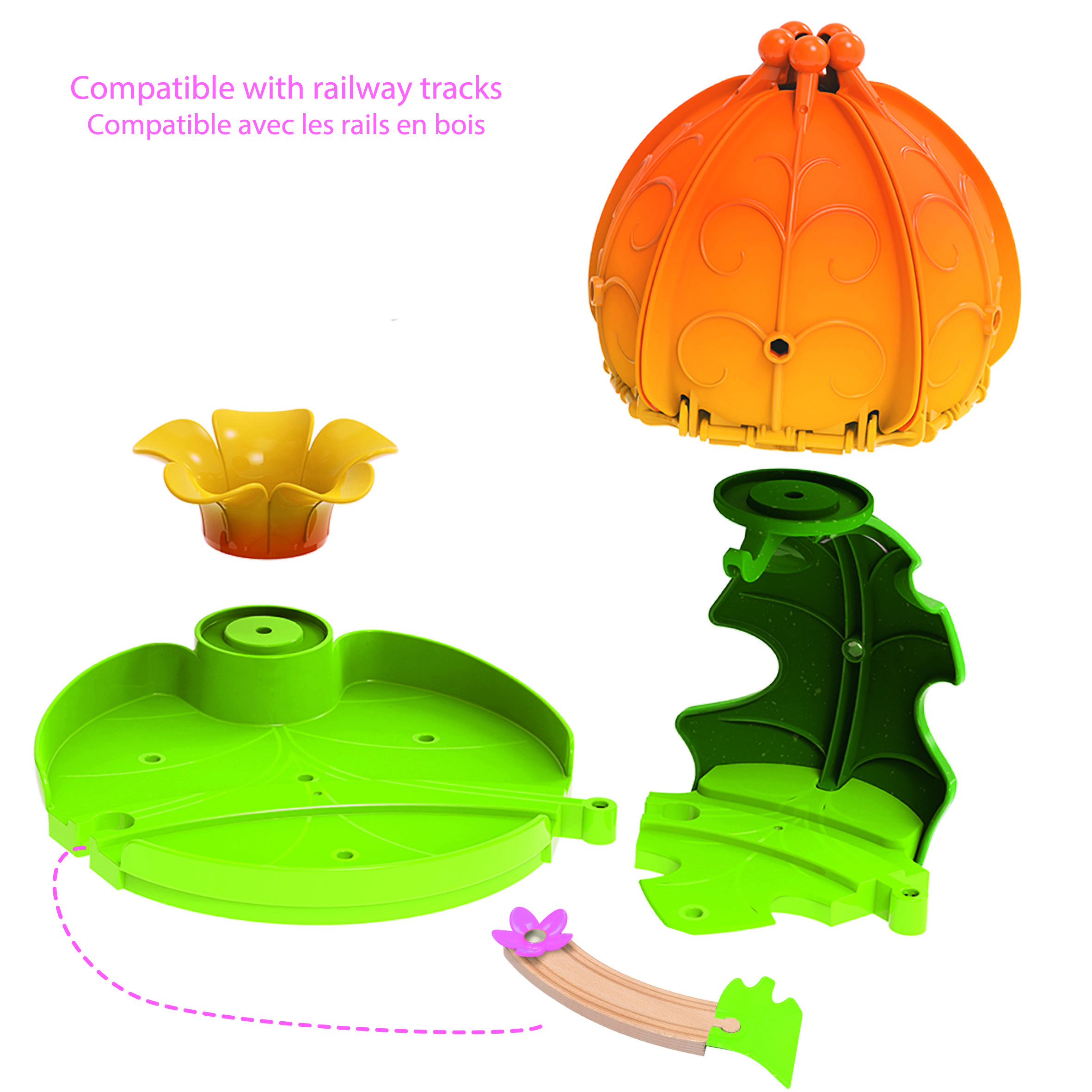 Ein Spielzeug-Sortierset aus bunten, ineinander passbaren Teilen. Oberteile in Kürbisform, Sockel grün, verbunden mit Schienen.