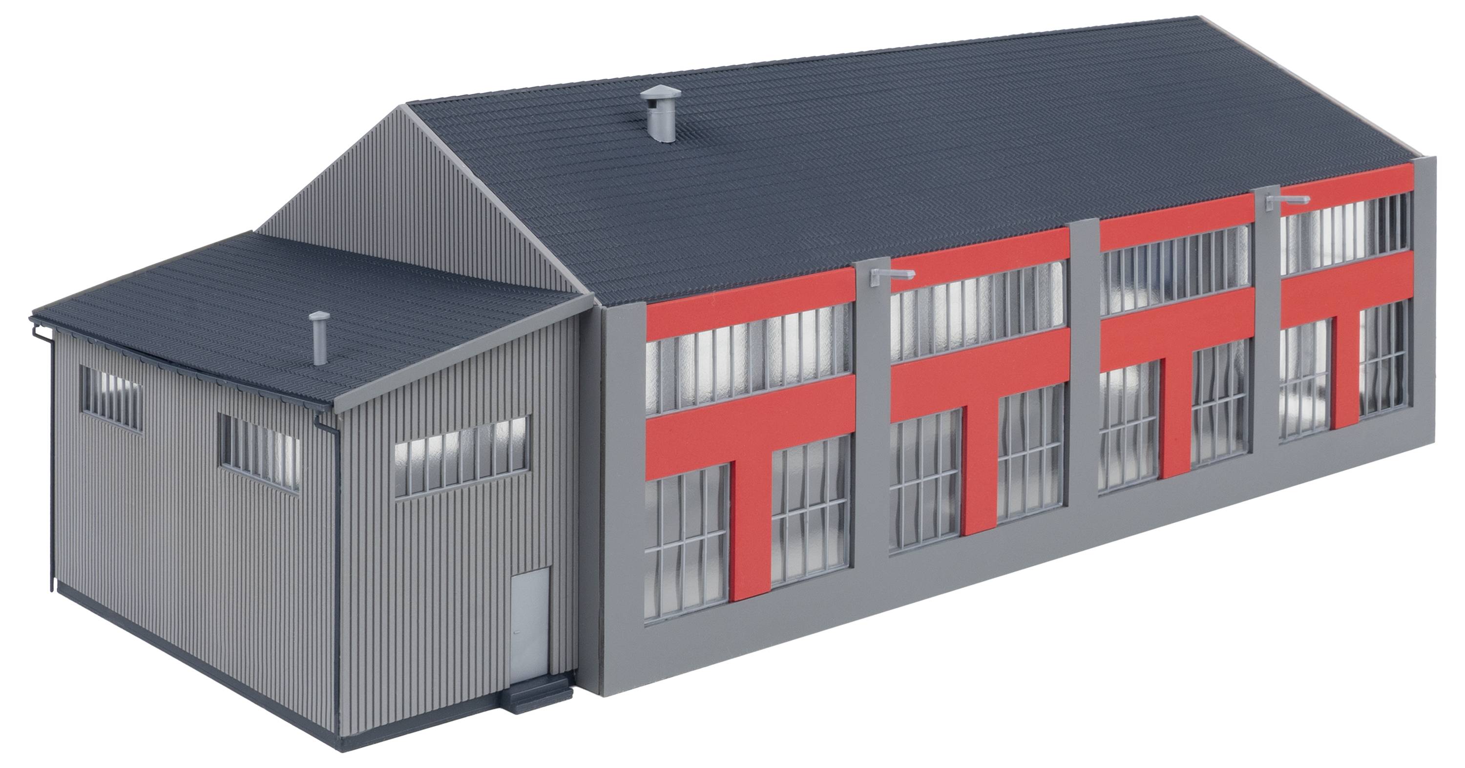 Graues Industriegebäude mit rotem Akzent, großes Dach, mehrere Fensterreihen; moderner Architekturstil.