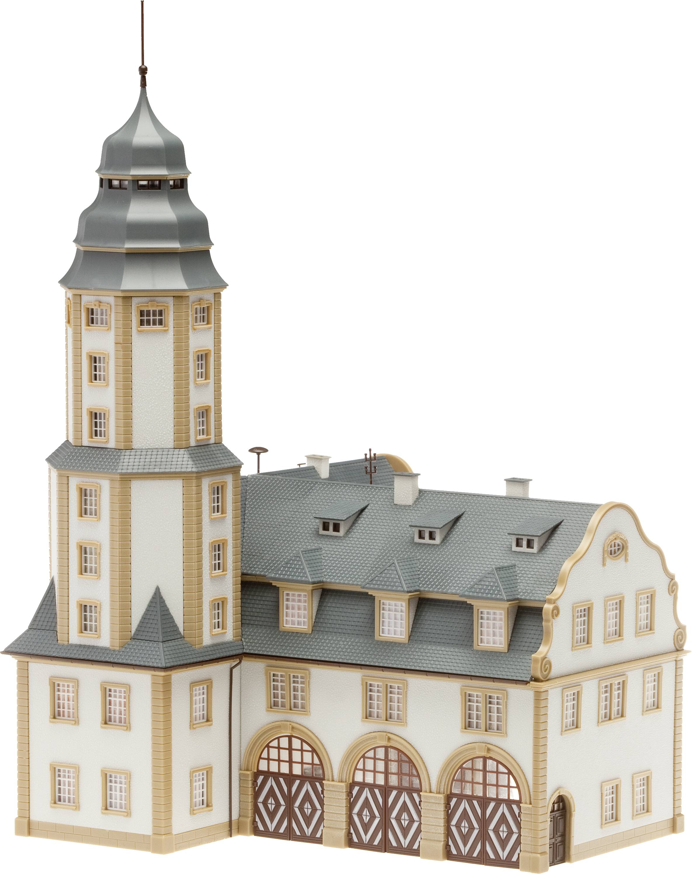 Ein mehrstöckiges Modellgebäude mit Turm und grauem Dach, das historische Architektur zeigt.
