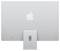 Rückseite eines silbernen Desktop-Computers mit einem Apfel-Logo in der Mitte, zentraler Standfuß, keine weiteren Details sichtbar.
