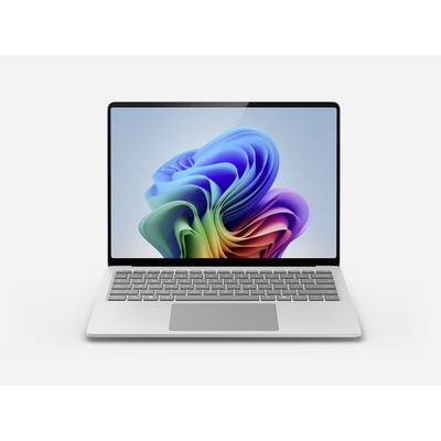 Ein silberner Laptop mit einem bunten abstrakten Design auf dem Bildschirm, vor einem schlichten Hintergrund.
