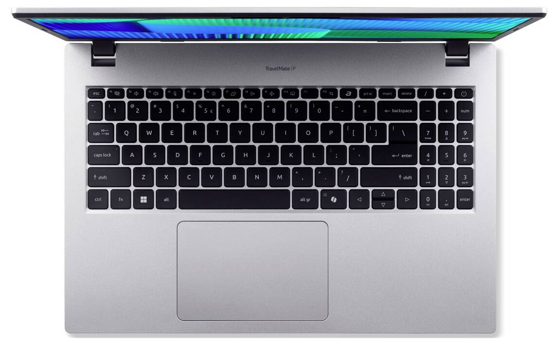 Ein silberner Laptop, geöffnet und von oben sichtbar, mit Tastatur und Touchpad sowie einem bunten Bildschirm.