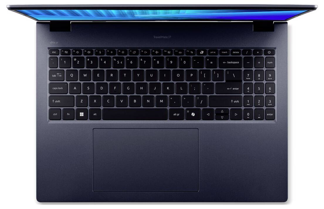 Ein Laptop von oben betrachtet, der eine vollständige Tastatur, ein großes Trackpad und einen geöffneten Bildschirm mit einem blauen Muster zeigt.