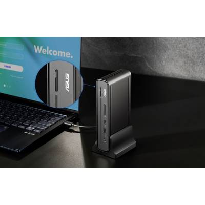 Eine kompakte, vertikale ASUS-Dockingstation, die mit einem Laptop verbunden ist. Der Bildschirm zeigt eine 'Willkommen'-Nachricht, die die digitale Konnektivität betont.