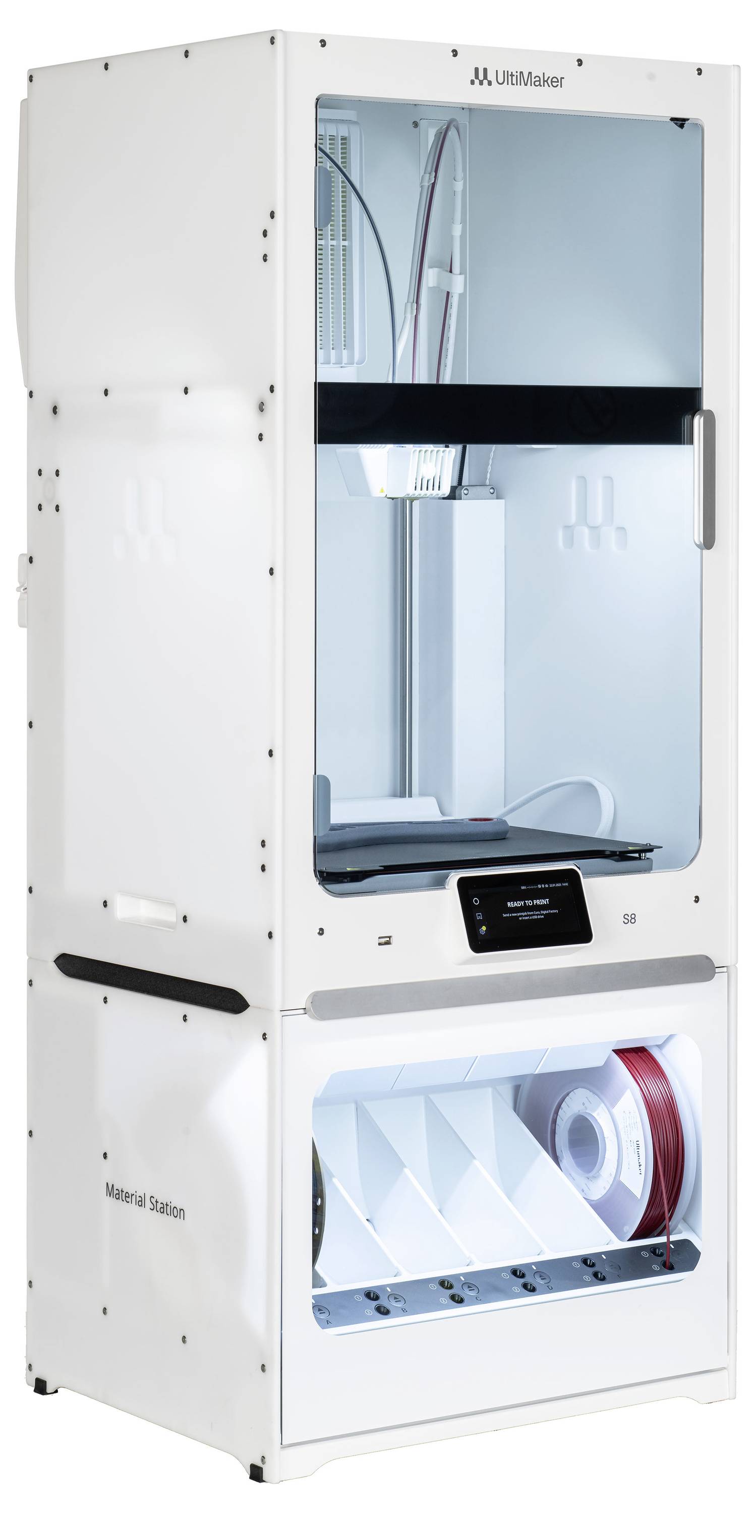 Ein 3D-Drucker mit geschlossenem Gehäuse und Materialstation darunter. Das obere Fach enthält den Druckmechanismus, das untere Fach Filamentspulen.