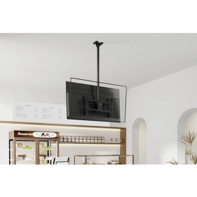 Eine an der Decke montierte, verstellbare TV-Bildschirm, der über einem modernen Café-Interieur hängt, mit einer Speisekarte und einer Backwarenvitrine im Hintergrund.