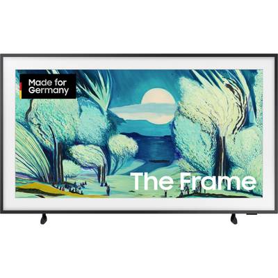 Ein Fernseher zeigt ein Naturgemälde mit Bäumen und einem Mond. Oben links steht 'Made for Germany', unten rechts 'The Frame'.