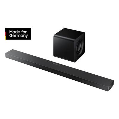 Eine schwarze Soundbar und ein Subwoofer mit der Aufschrift 'Made for Germany' oben links.