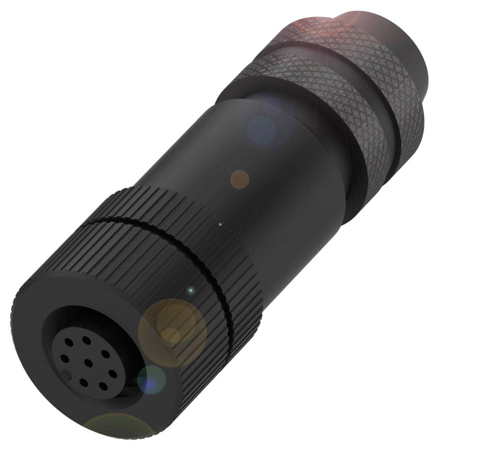Ein schwarzer, zylindrischer Stecker mit mehreren Löchern auf einer Seite, vermutlich für eine elektrische Verbindung geeignet.