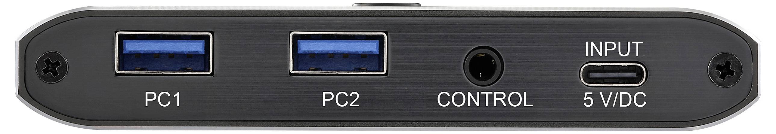 Eine Nahaufnahme eines Gerätepanels mit zwei USB-Anschlüssen, die als "PC1" und "PC2" beschriftet sind, einem "Control"-Anschluss und einem USB-C-Eingang, der mit "5V DC" gekennzeichnet ist.