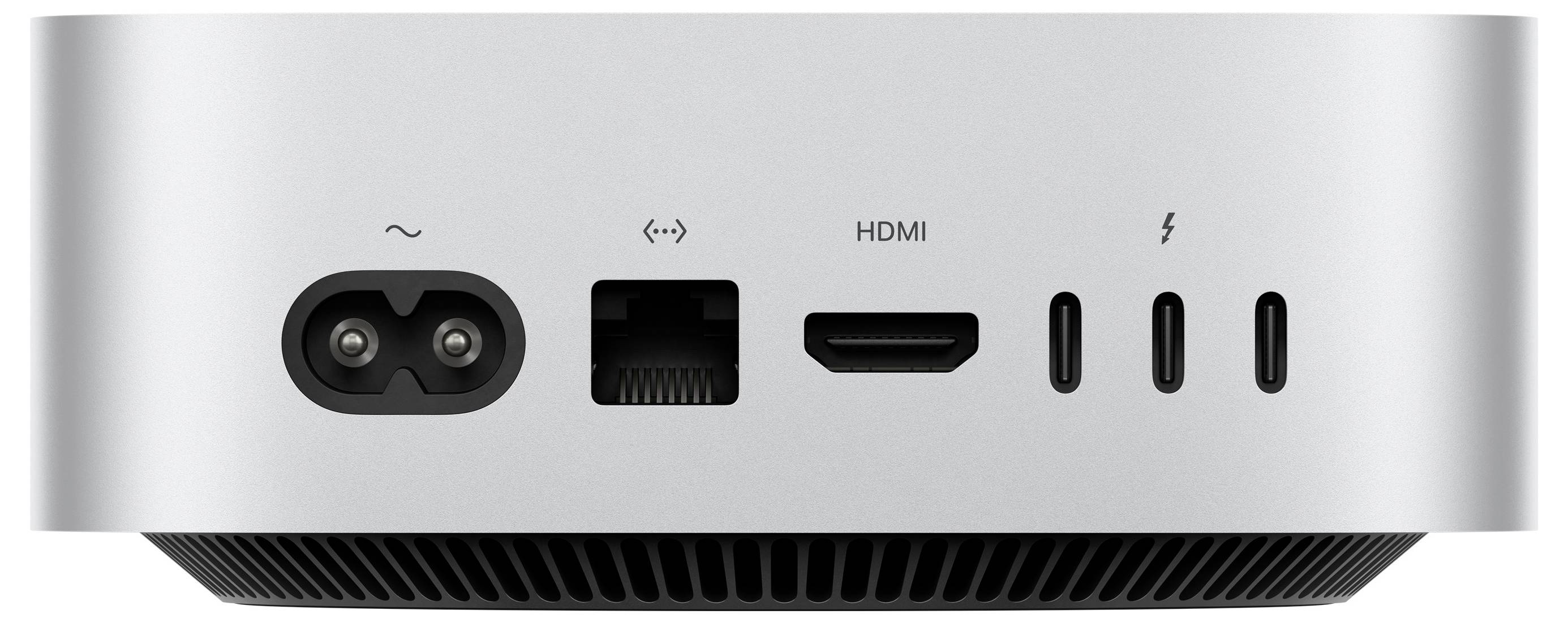 Das Bild zeigt die Rückansicht eines kompakten elektronischen Geräts mit Anschlüssen: Stromversorgung, Ethernet, HDMI und mehrere USB-C-Ports, die verschiedene Konnektivitätsoptionen anzeigen.