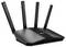 Ein schwarzer WLAN-Router mit vier Antennen, versehen mit einem 'ASUS'-Logo.