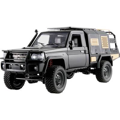 Schwarzes Geländefahrzeug mit großer Bodenfreiheit und verstärktem Frontschutz, geeignet für Off-Road-Einsätze und Abenteuertouren.