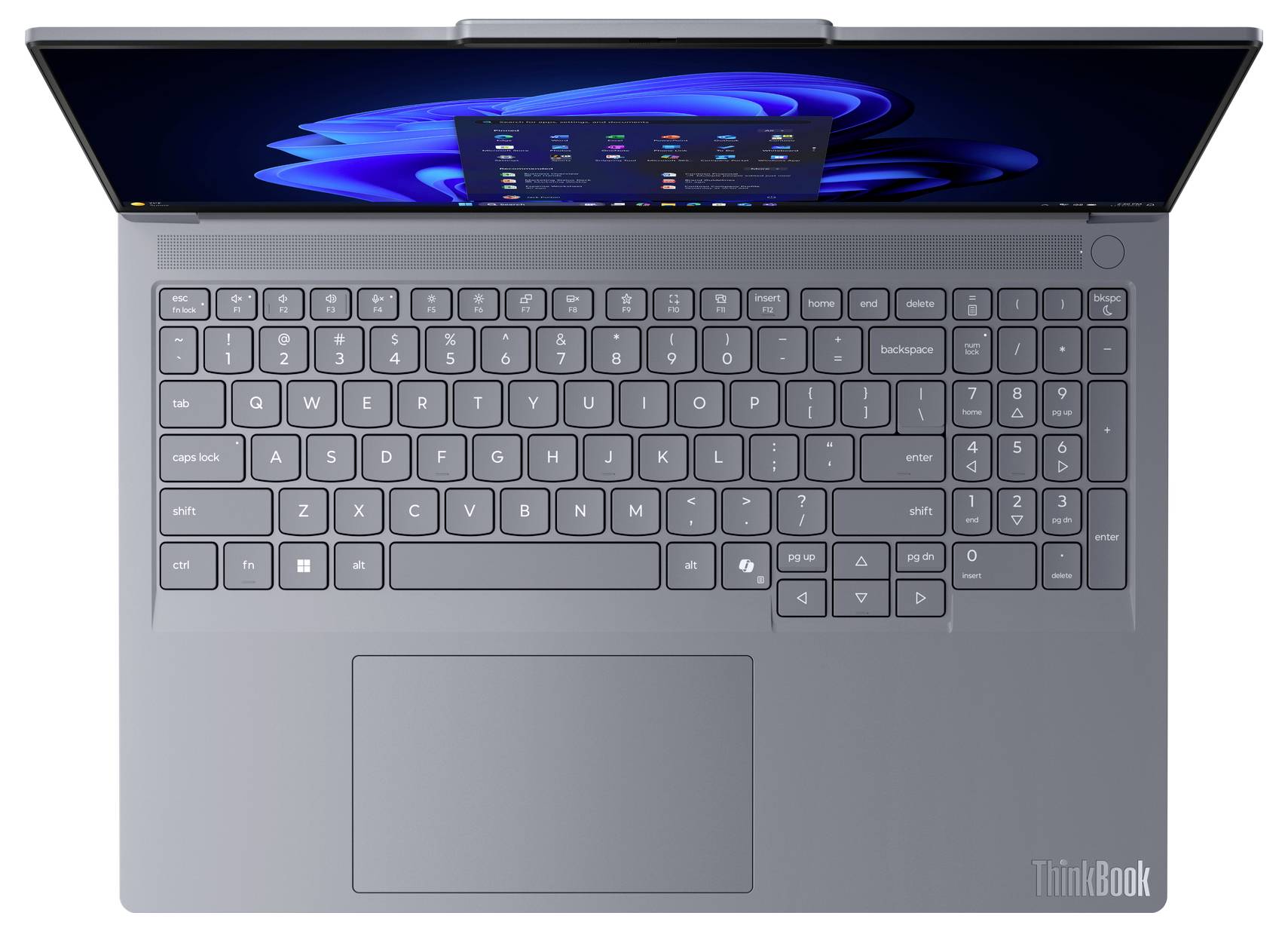 Draufsicht eines geöffneten Laptops mit sichtbarer Tastatur und einem Display, das einen Windows-Desktop zeigt.