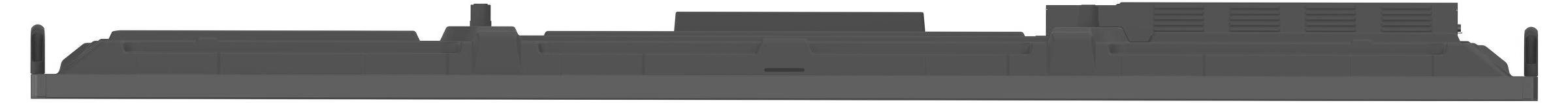 Silhouette eines großen Gebäudes mit mehreren Abschnitten und einem zentralen Turm, von der Seite betrachtet.