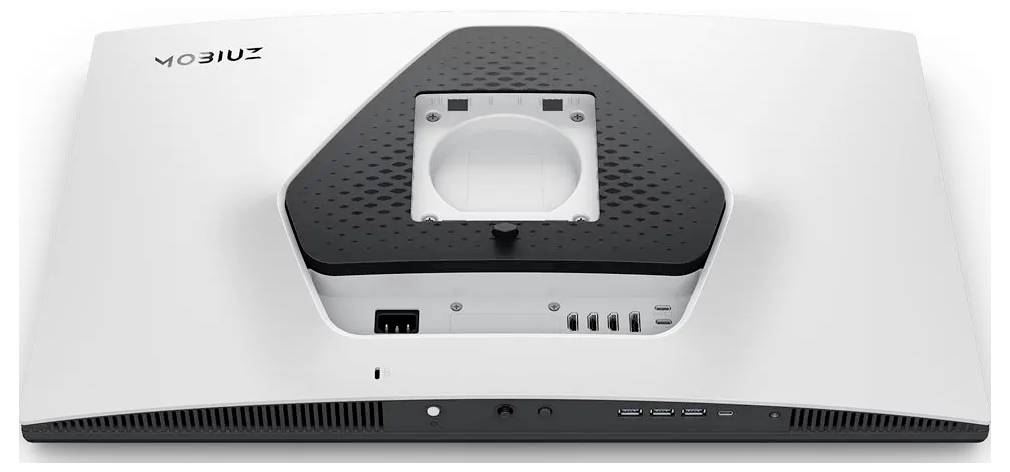 Rückansicht eines weißen Computermonitors mit zentraler Halterung, mehreren Anschlüssen und Lüftungsbereichen, von oben betrachtet.