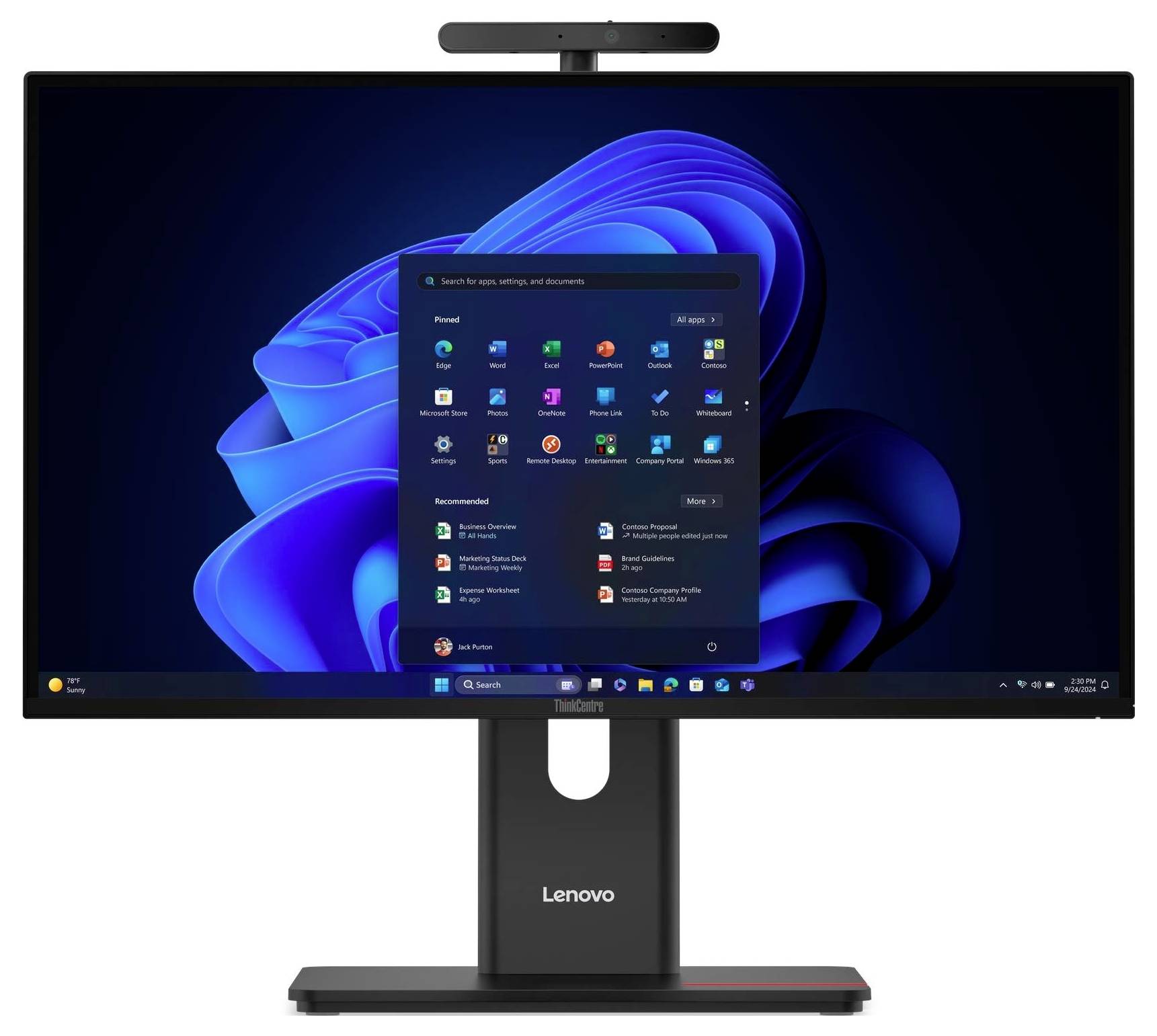 Ein Computermonitor, der den Windows 11 Startmenü-Bildschirm zeigt, mit verschiedenen angehefteten Apps und einem blauen abstrakten Hintergrund.