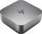 Ein kompaktes, graues elektronisches Gerät mit einem Logo auf der Oberseite, das einen einzelnen Knopf und einen Anschluss aufweist, möglicherweise Teil eines Computersystems.