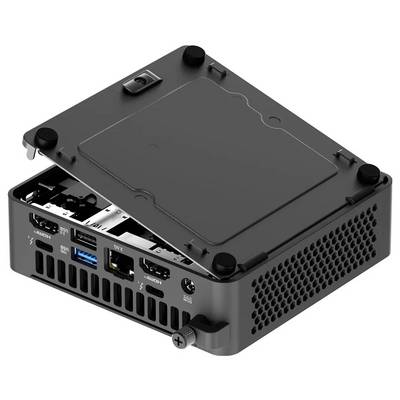 Kleiner schwarzer Computergehäuse mit offener Abdeckung, die HDMI-, USB- und Ethernet-Anschlüsse zeigt. Schwarze Schrauben an den Ecken, Lüftungslöcher an der Seite.