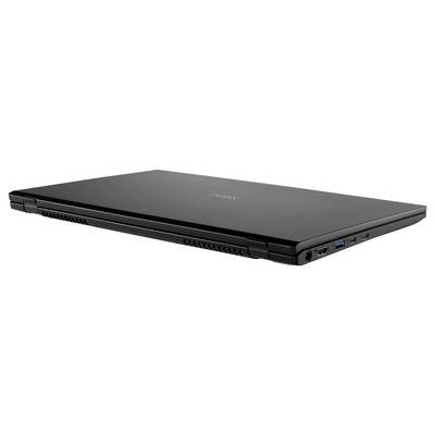 Geschlossener schwarzer Laptop, der Anschlüsse für Konnektivität an der Seite zeigt.