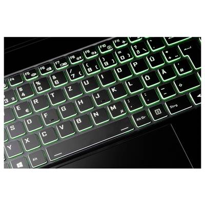 Eine Tastatur mit Hintergrundbeleuchtung und grüner Beleuchtung, deren Tasten sowohl in Standard- als auch in deutschen Sonderzeichen beschriftet sind, einschließlich Umlaute.