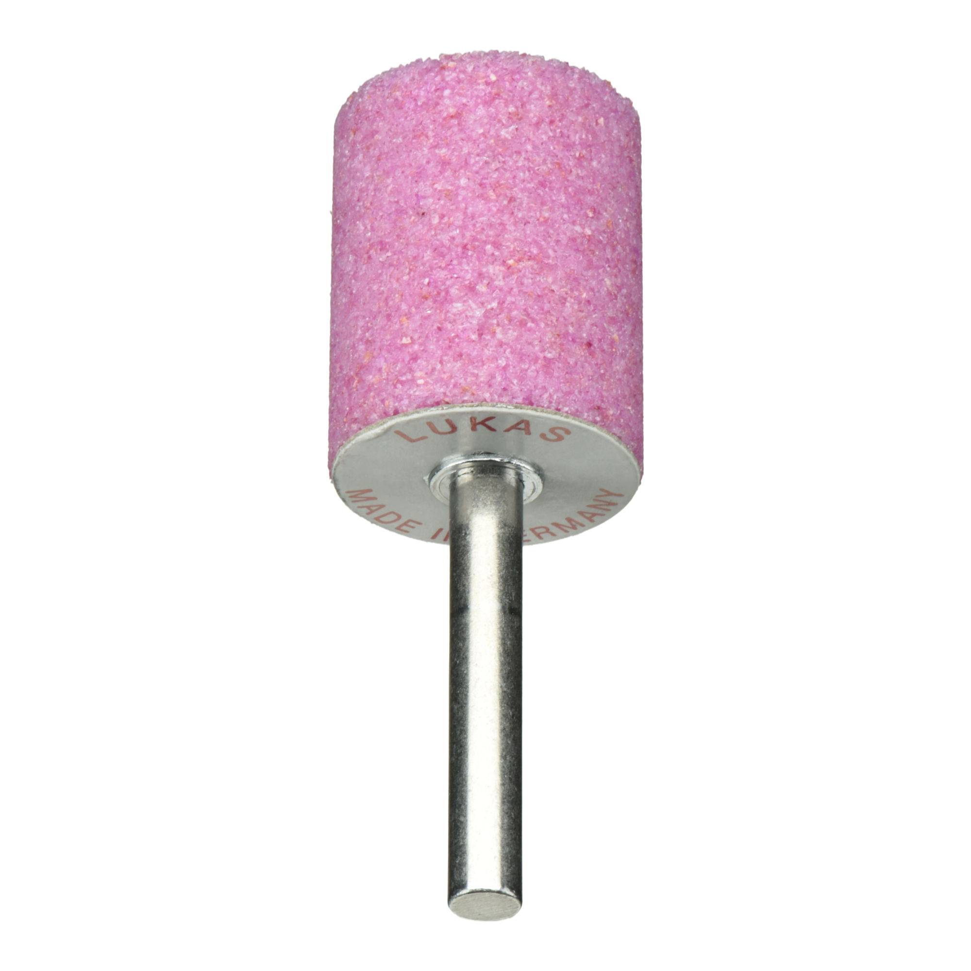 Ein rosa zylindrischer Schleifstein mit einem Metallschaft, beschriftet mit 'LUKAS' und 'Made in Germany'.