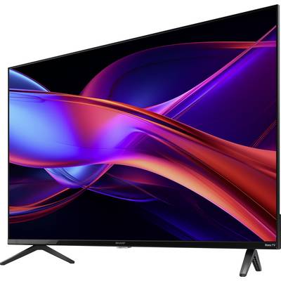 Ein schlanker Flachbildschirm-Fernseher mit einer lebendigen, mehrfarbigen Anzeige, die abstrakte geschwungene Linien zeigt, montiert auf einem Ständer mit schmalen Rahmen.