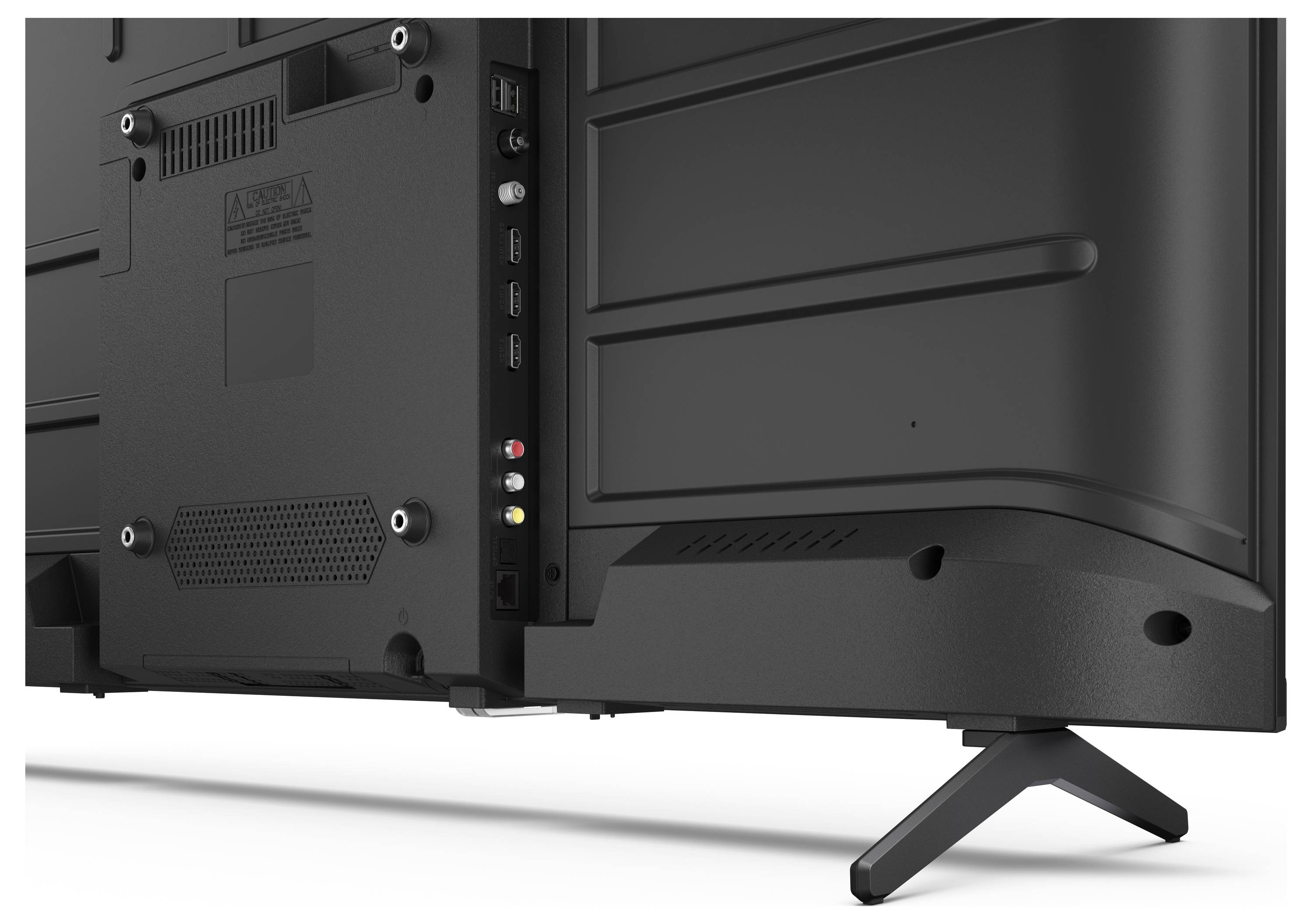 Rückansicht eines Flachbildfernsehers, der verschiedene Anschlüsse wie HDMI, USB und Audio zeigt. Der Fernseher steht auf einem Standfuß.