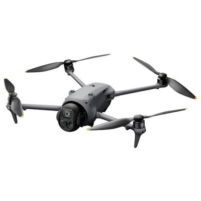 Ein grauer Quadcopter-Drohne mit vier Propellern ist zu sehen, ausgestattet mit einer Kamera an der Front, konzipiert für Luftfotografie und Videoaufnahmen.